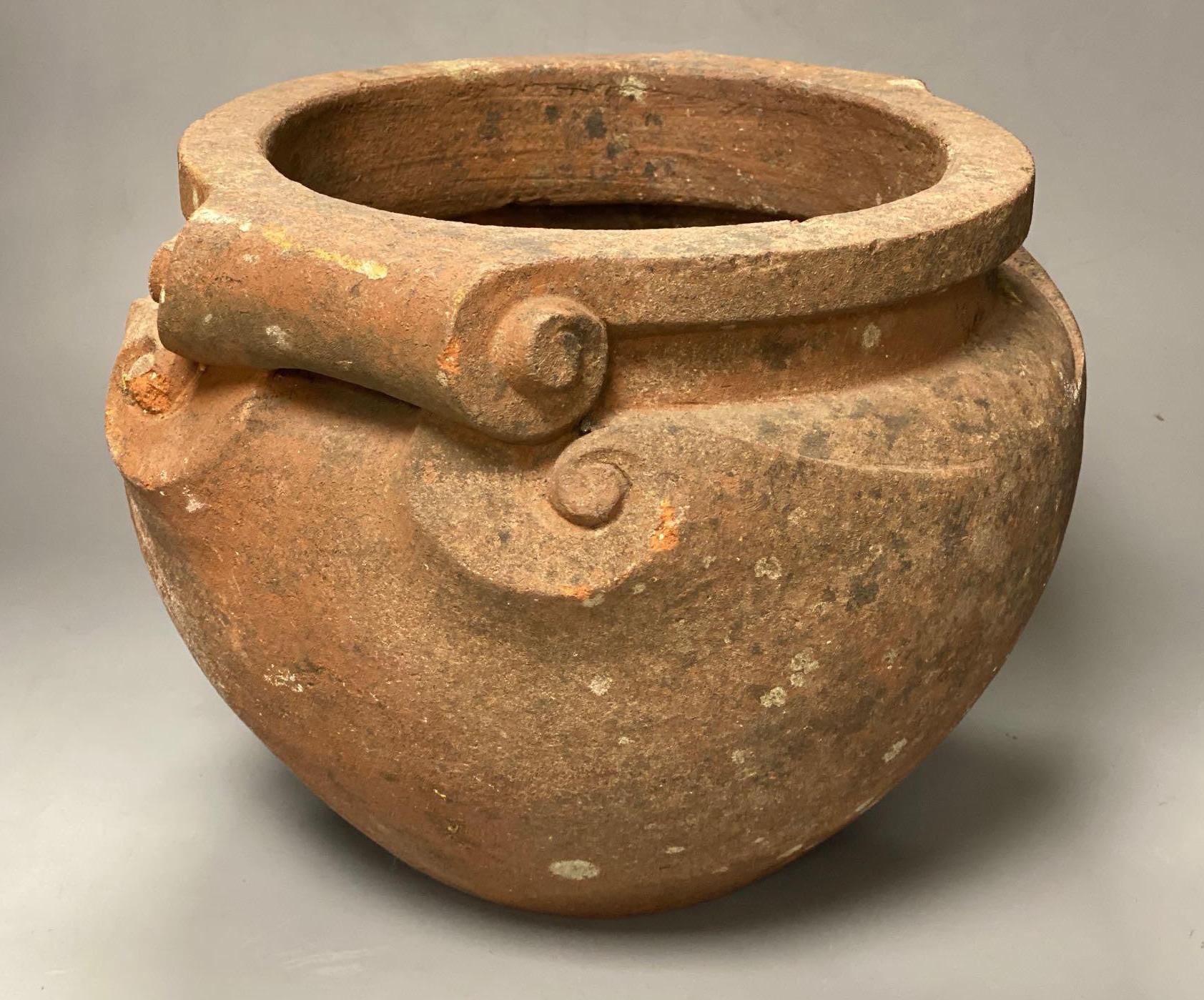 A Compton terracotta scroll pot, initialled N.T., 31cm